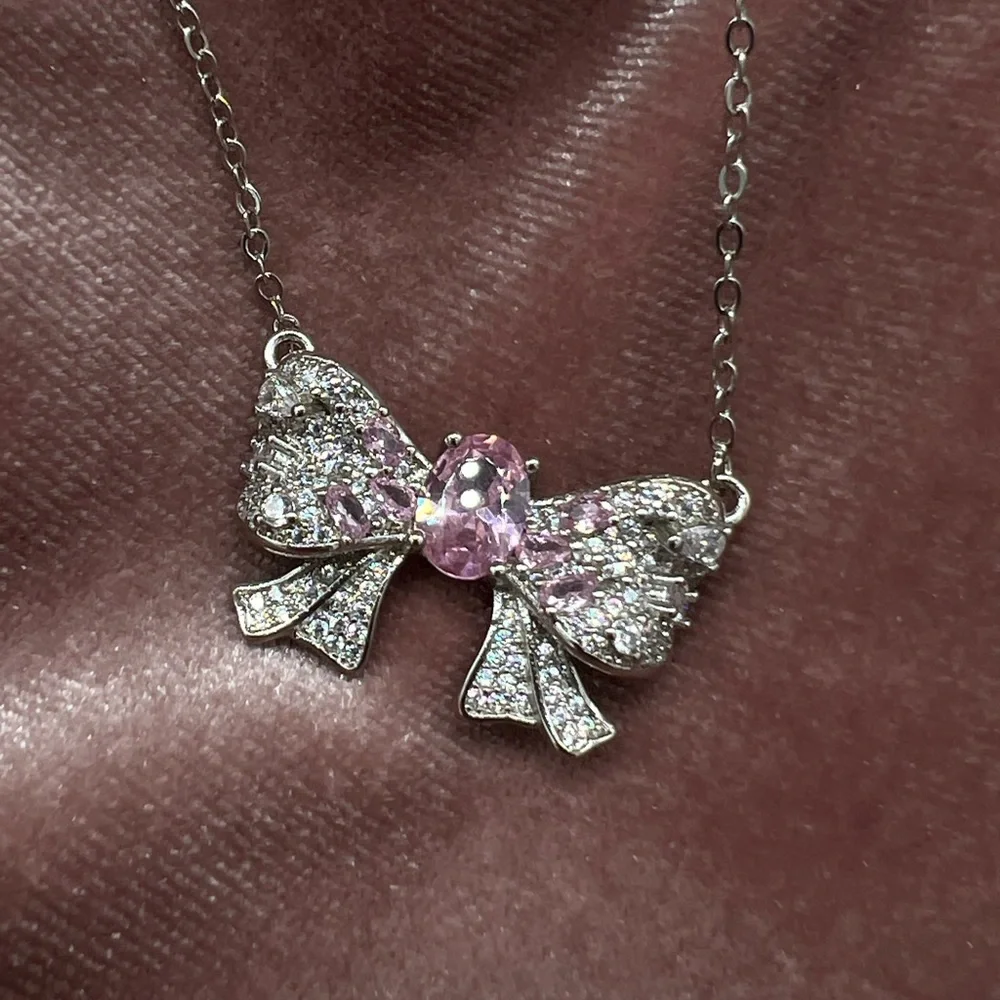 Clear and Pink Zircon Bow Pendant Necklace